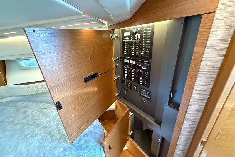 Slide: The Image of Electrical panel inside 2026 Tiara Yachts 43 LE, showcasing modern yacht interior design. - 52