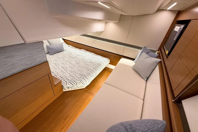 Slide: The Image of Luxurious interior of 2026 Tiara Yachts 43 LE, featuring elegant wood and modern furnishings. - 56