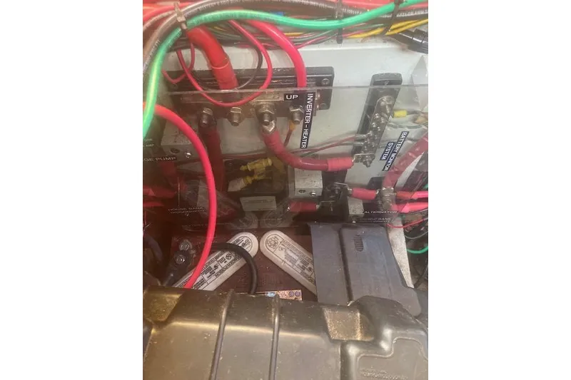 Slide: The Image of Electrical wiring and components inside a 1985 Baba 40 Pilot House boat. - 25