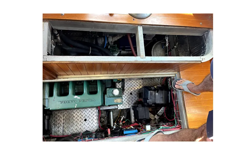 Slide: The Image of Engine compartment of a 1985 Baba 40 Pilot House sailboat with Volvo Penta engine. - 34