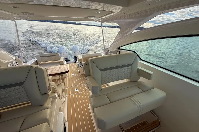 Slide: The Image of Luxurious 2026 Tiara Yachts 34 LX interior with elegant seating and scenic water view. - 33