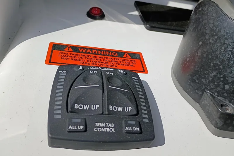 Slide: The Image of Control panel of 2021 Sea Hunt Gamefish 27 Coffin Box with warning label. - 12