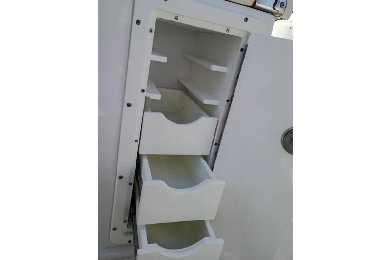 Slide: The Image of 2021 Sea Hunt Gamefish 27 Coffin Box storage drawers, open and empty. - 20