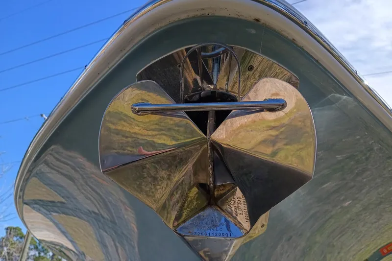 Slide: The Image of 2021 Sea Hunt Gamefish 27 Coffin Box boat anchor detail under clear blue sky. - 22