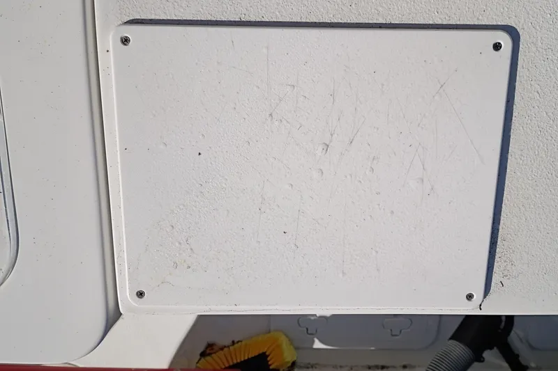 Slide: The Image of 2021 Sea Hunt Gamefish 27 Coffin Box, white panel with visible scratches. - 35