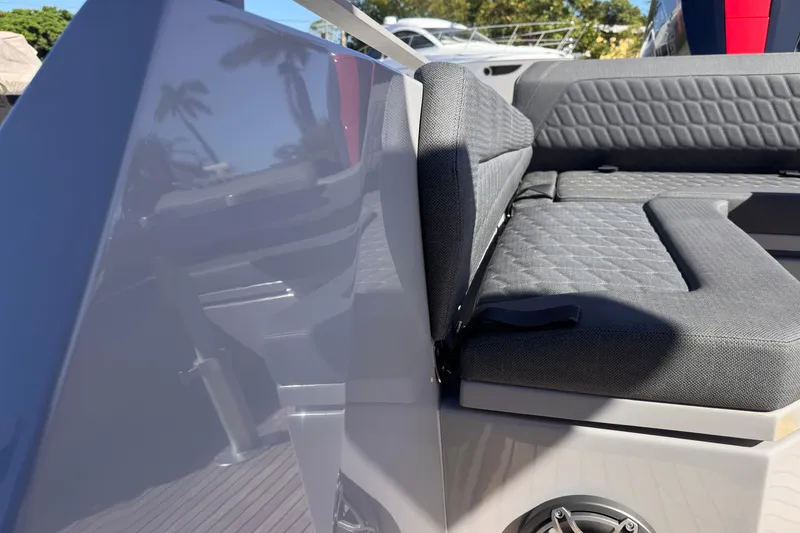 Slide: The Image of Luxury seating on 2025 Skipper-BSK 38NC boat, featuring quilted upholstery and sleek design. - 25