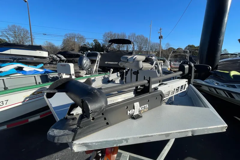 Slide: The Image of 2021 G3 Gator Tough 17 CCJ DLX boat with Minn Kota Ultrex motor, parked outdoors. - 12