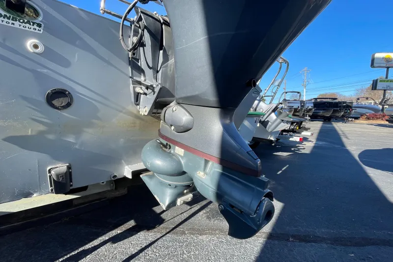 Slide: The Image of 2021 G3 Gator Tough 17 CCJ DLX boat engine close-up in outdoor setting. - 4