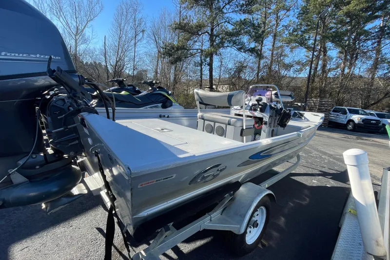 Slide: The Image of 2021 G3 Gator Tough 17 CCJ DLX boat on trailer, parked outdoors. - 6