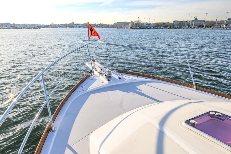Slide: The Image of Bow view of 2009 Sabre 42 Hard Top Express yacht on calm waters. - 22