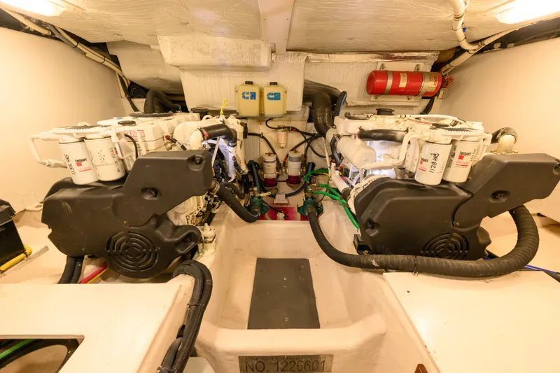 Slide: The Image of Engine room of 2009 Sabre 42 Hard Top Express with dual engines and fire extinguisher. - 40