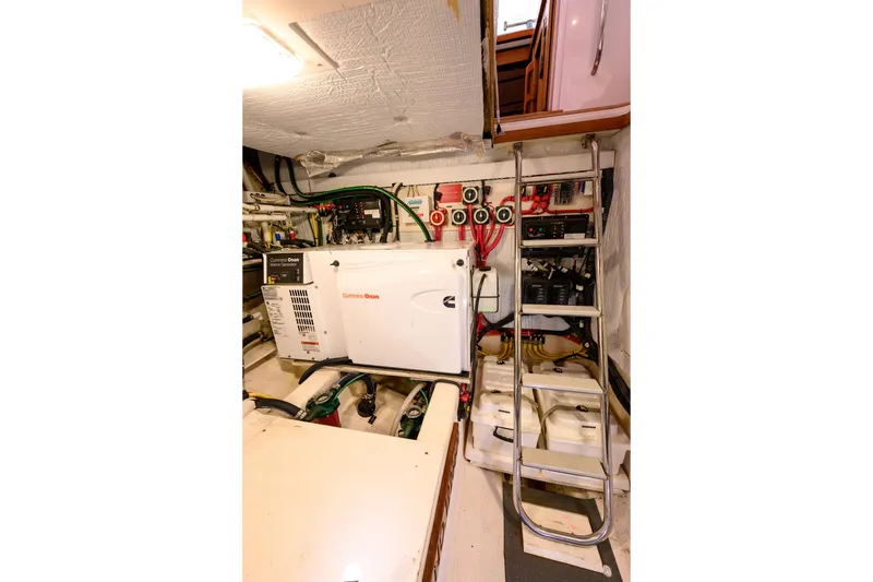 Slide: The Image of Engine room of 2009 Sabre 42 Hard Top Express with Cummins Onan generator. - 44