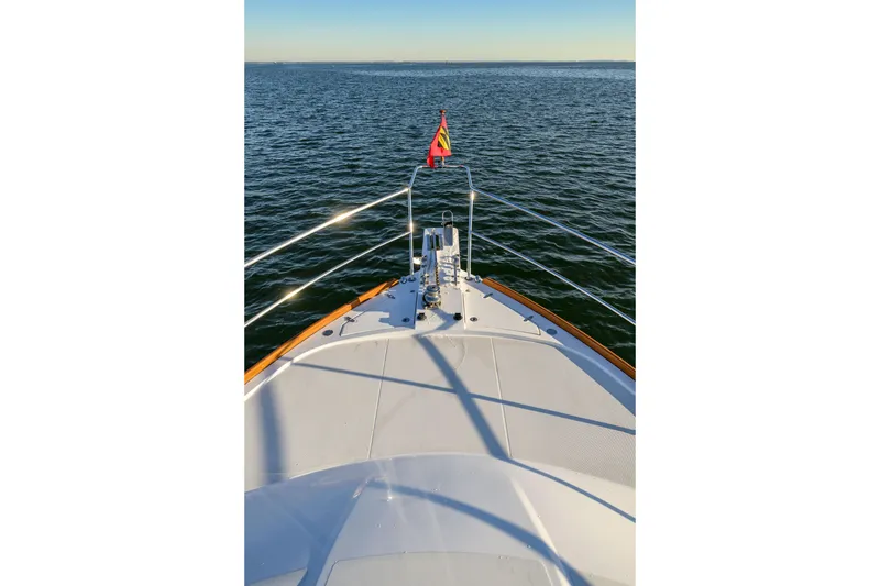 Slide: The Image of Bow view of 2009 Sabre 42 Hard Top Express on open water. - 9