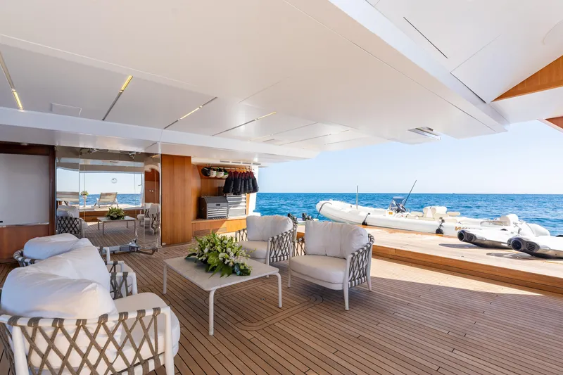Slide: The Image of Luxurious interior of 2020 Sanlorenzo 44 Alloy yacht with elegant seating and dining area. - 10