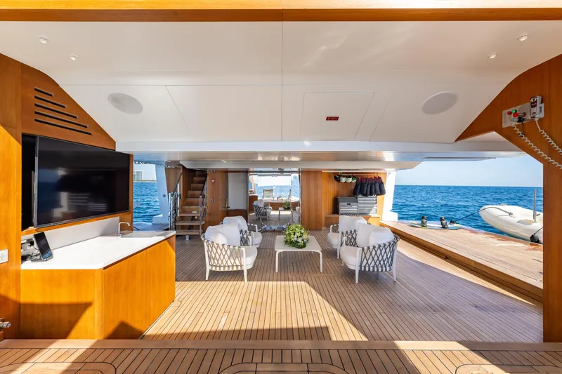 Slide: The Image of Luxurious dining area on 2020 Sanlorenzo 44 Alloy yacht with elegant table setting. - 13