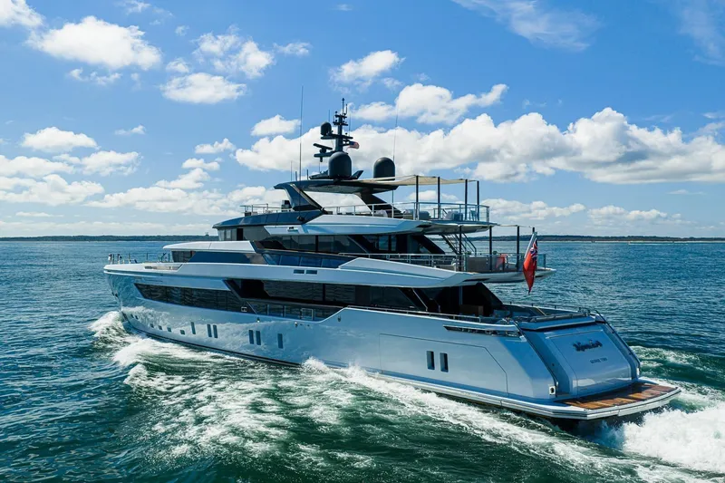 Slide: The Image of Luxury Sanlorenzo 44 Alloy yacht cruising on open water, 2020 model. - 2