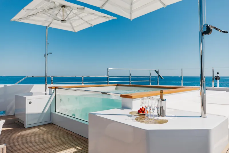 Slide: The Image of Luxurious interior of 2020 Sanlorenzo 44 Alloy yacht with modern design and ocean view. - 22