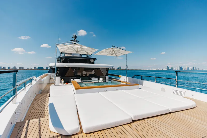 Slide: The Image of Luxurious Sanlorenzo 44 Alloy yacht interior, 2020 model, featuring elegant seating and ocean view. - 24