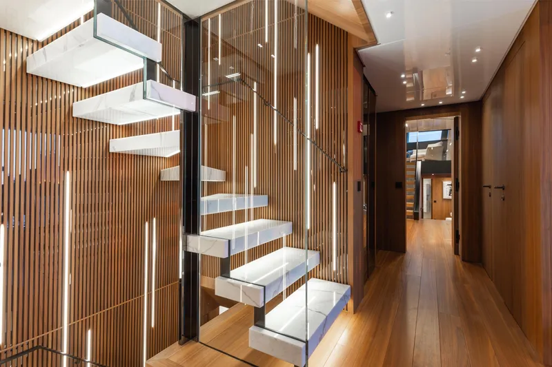 Slide: The Image of Luxurious 2020 Sanlorenzo 44 Alloy yacht deck with elegant seating and ocean view. - 26