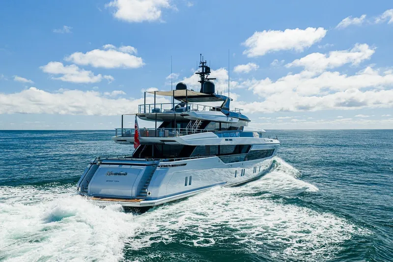 Slide: The Image of Luxury Sanlorenzo 44 Alloy yacht cruising on open sea under clear blue sky, 2020 model. - 3