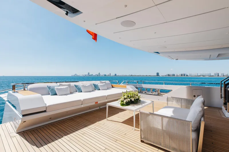 Slide: The Image of Luxurious 2020 Sanlorenzo 44 Alloy yacht deck with dining area and ocean view. - 42