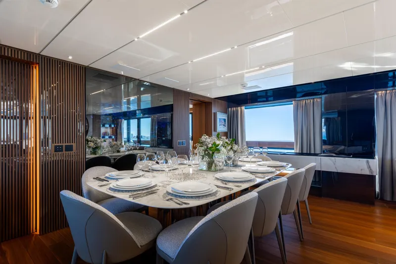 Slide: The Image of Luxurious Sanlorenzo 44 Alloy yacht deck with jacuzzi, umbrellas, and ocean view, 2020 model. - 50