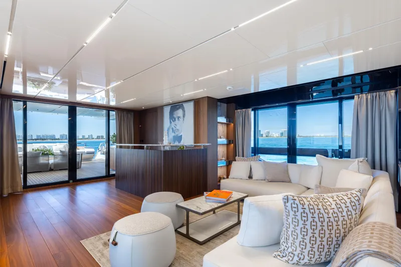 Slide: The Image of Luxurious Sanlorenzo 44 Alloy yacht deck with jacuzzi, champagne, and ocean view, 2020 model. - 51