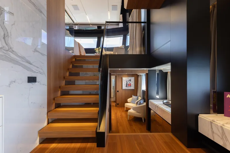 Slide: The Image of Luxurious 2020 Sanlorenzo 44 Alloy yacht deck with elegant seating and ocean view. - 56