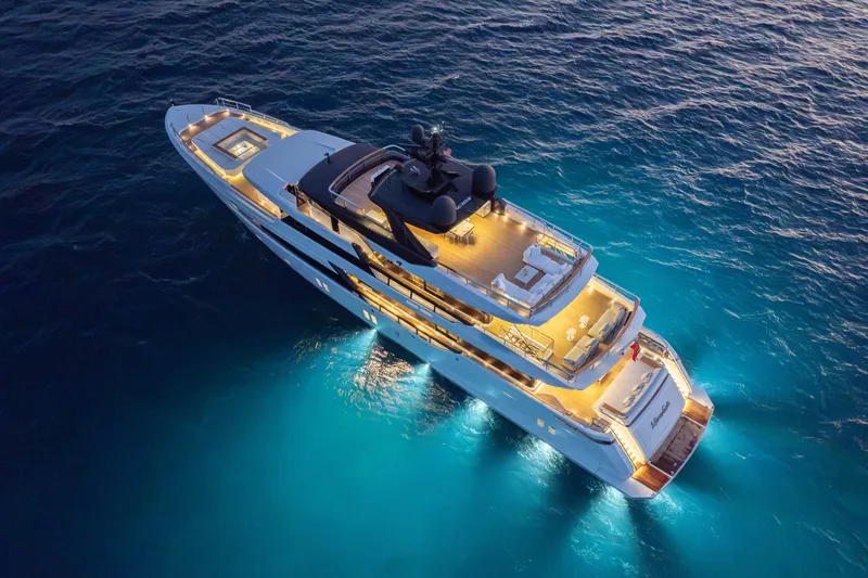 Slide: The Image of Luxurious 2020 Sanlorenzo 44 Alloy yacht deck with elegant seating and ocean view. - 8