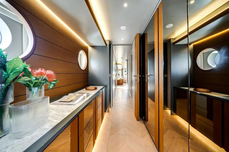 Slide: The Image of Luxurious interior of 2026 Azimut Magellano 30M yacht with elegant wood paneling and modern decor. - 5