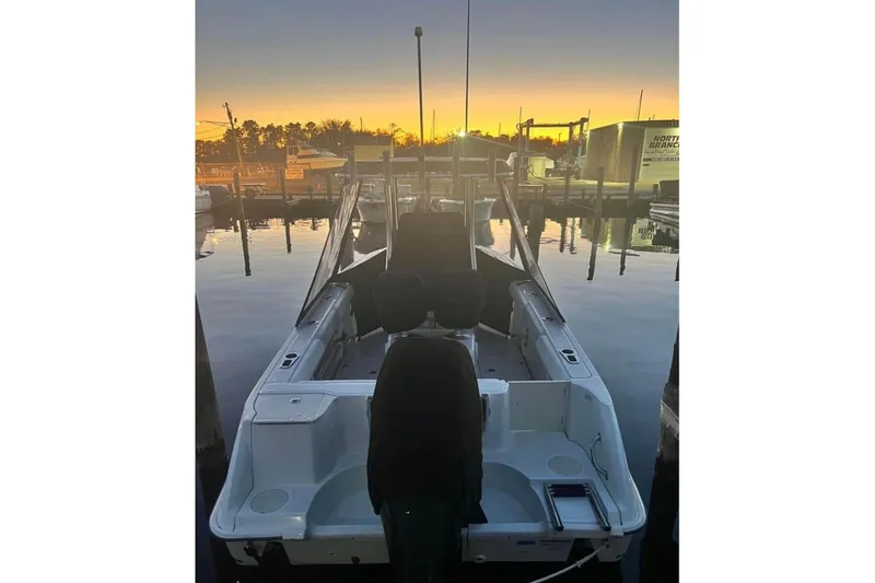 Slide: The Image of 2013 Boston Whaler 220 Outrage at sunset in marina. - 7
