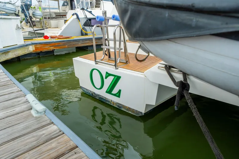 Slide: The Image of 2019 Bali 4.1 yacht helm station with marina view, showcasing modern design and nautical equipment. - 10