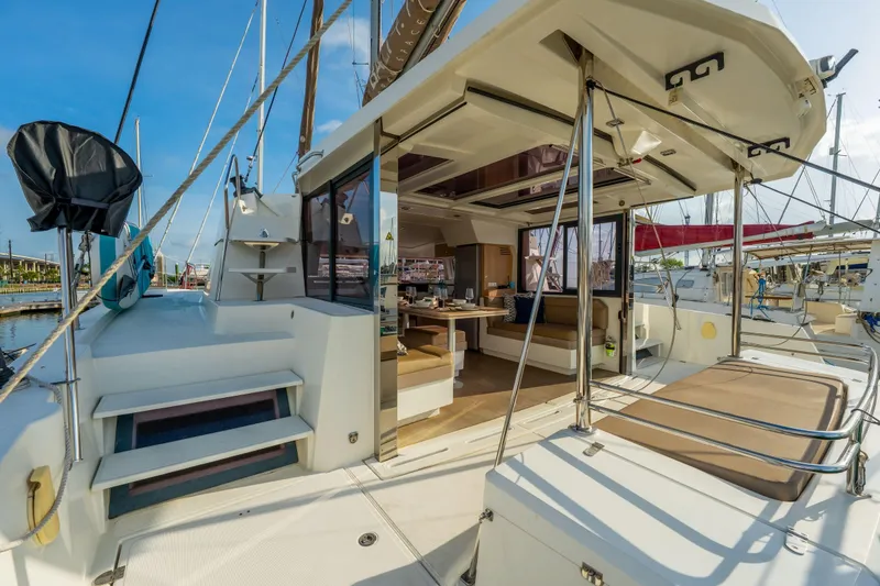 Slide: The Image of Luxurious interior of 2019 Bali 4.1 yacht with dining area and modern amenities. - 15