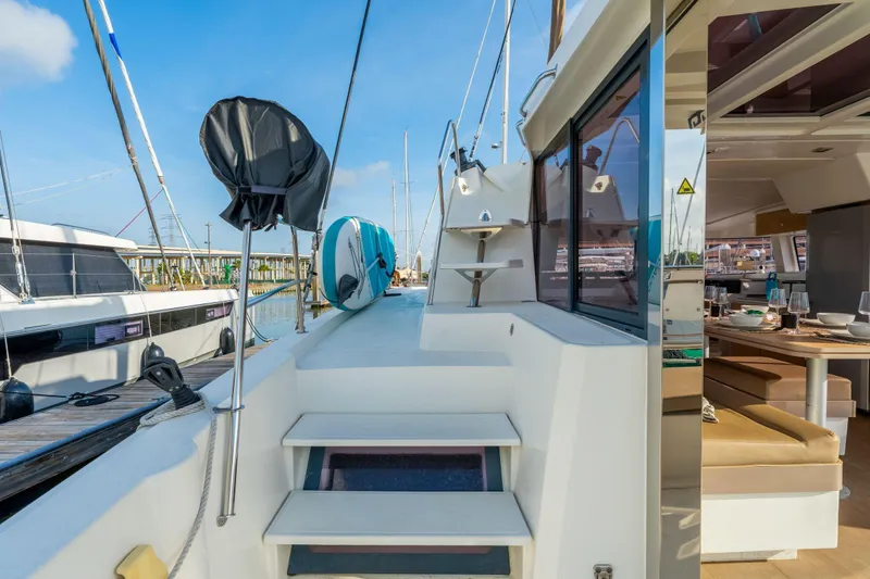 Slide: The Image of Luxurious interior of a 2019 Bali 4.1 catamaran with elegant dining area and modern amenities. - 16