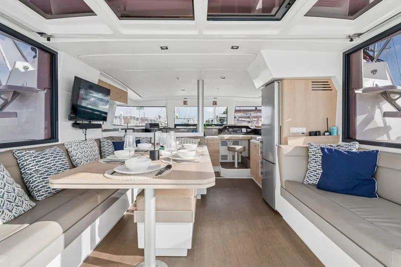 Slide: The Image of Modern interior of a 2019 Bali 4.1 yacht with kitchen and seating area. - 22