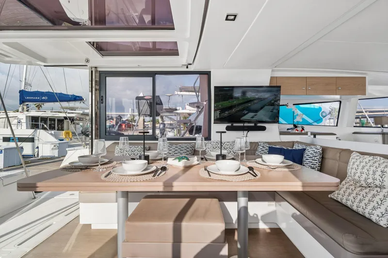 Slide: The Image of Control panel of a 2019 Bali 4.1 yacht with navigation equipment and wiring. - 24