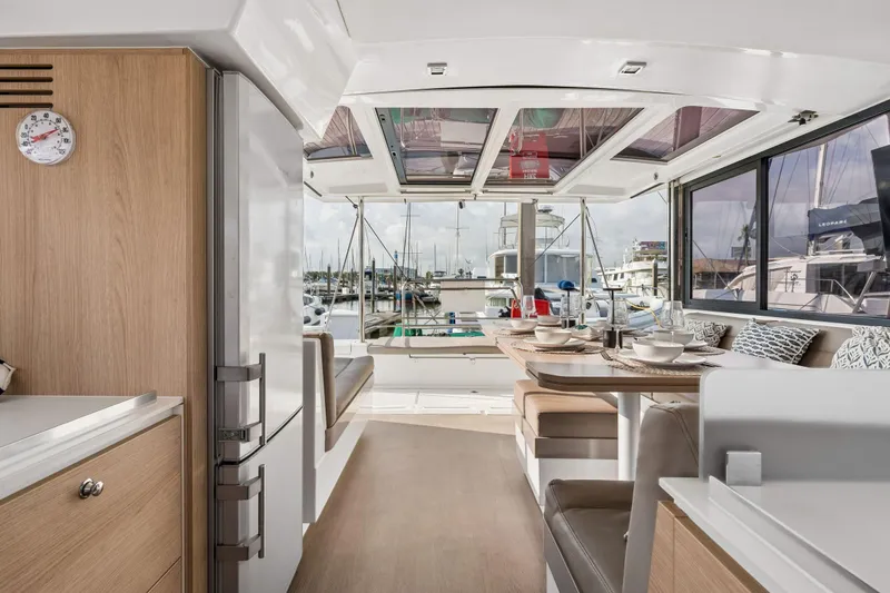 Slide: The Image of Interior of 2019 Bali 4.1 yacht with open cabinet and control panel. - 25