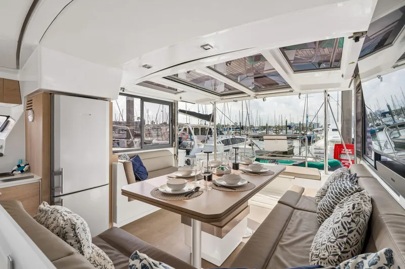 Slide: The Image of Interior of 2019 Bali 4.1 yacht featuring cozy bedroom and modern wooden cabinetry. - 26
