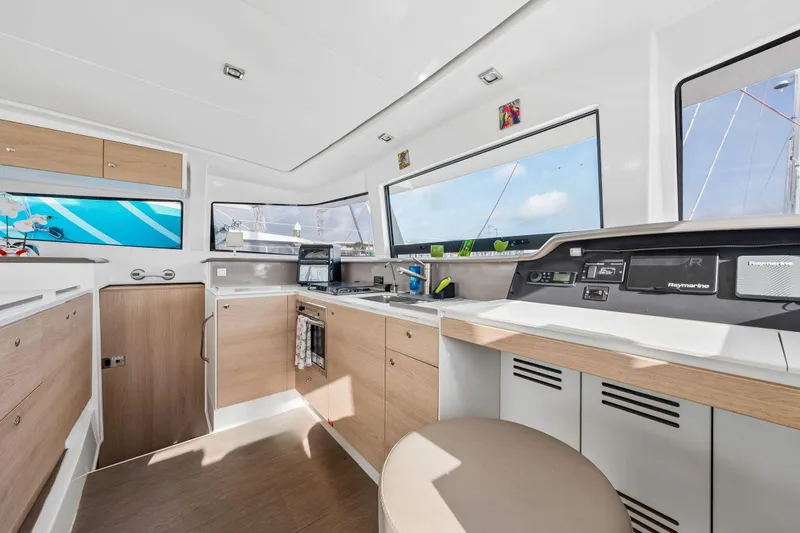 Slide: The Image of Modern bathroom interior on a 2019 Bali 4.1 yacht, featuring sleek wood finishes. - 30