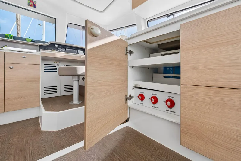 Slide: The Image of Luxurious interior of a 2019 Bali 4.1 yacht featuring a cozy bedroom and elegant decor. - 32