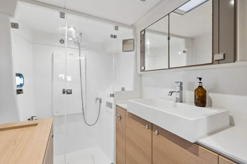 Slide: The Image of Interior of 2019 Bali 4.1 yacht cabin with modern design and wooden accents. - 36