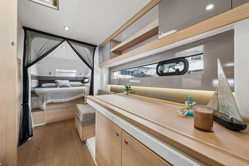 Slide: The Image of Control panel of a 2019 Bali 4.1 yacht with navigation and communication equipment. - 39