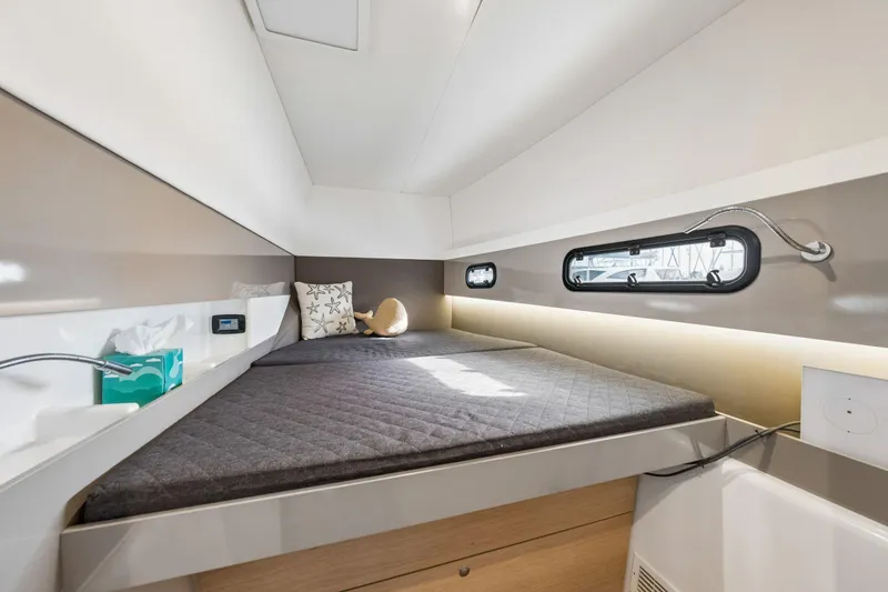 Slide: The Image of Control panel of a 2019 Bali 4.1 yacht with navigation and communication equipment. - 40