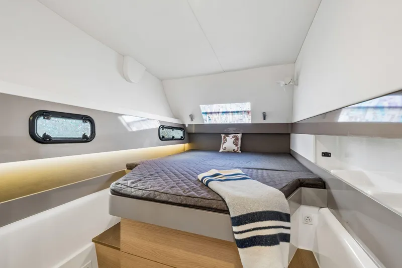 Slide: The Image of Battery compartment of a 2019 Bali 4.1 yacht with red cables and wooden flooring. - 42