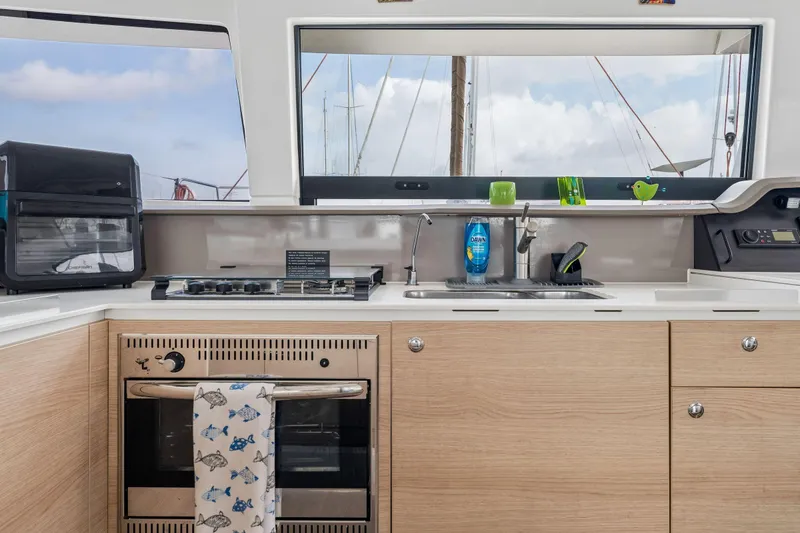 Slide: The Image of Engine compartment of a 2019 Bali 4.1 boat, featuring a Yanmar engine. - 45