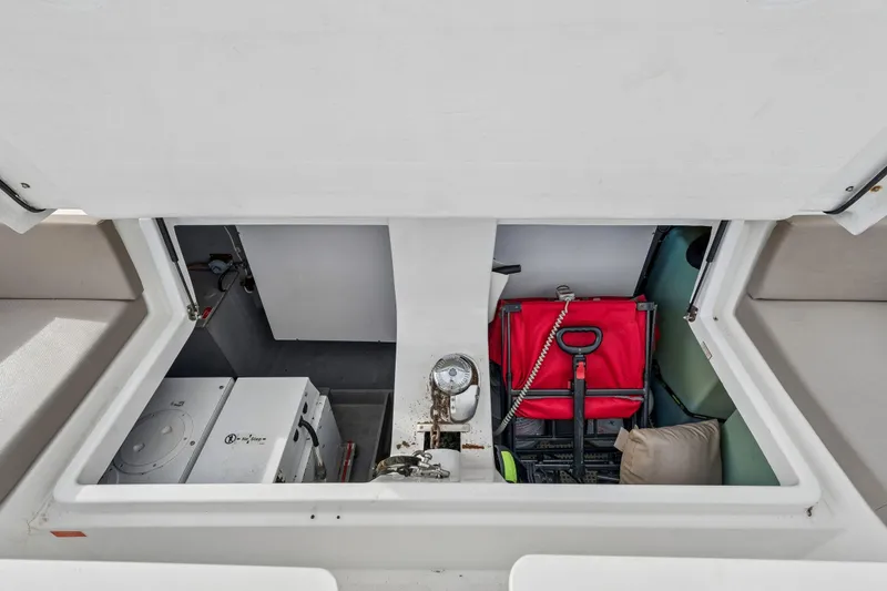 Slide: The Image of 2019 Bali 4.1 catamaran with spacious deck seating in a marina setting. - 55