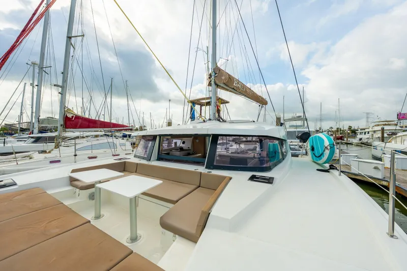 Slide: The Image of Modern 2019 Bali 4.1 catamaran interior with dining area and deck view. - 61