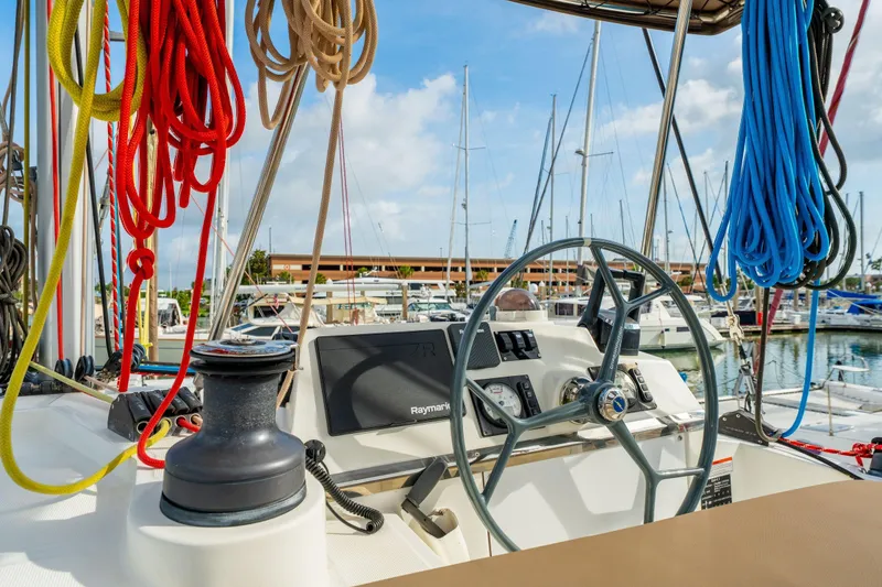 Slide: The Image of Sailing catamaran Bali 4.1, 2019 model, cruising on open sea under clear skies. - 73