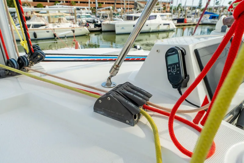 Slide: The Image of Sailing catamaran Bali 4.1, 2019 model, cruising on calm green sea. - 74