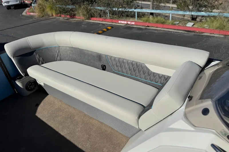 Slide: The Image of 2021 Crest Classic Platinum 240 SLC boat interior with elegant seating and modern design. - 12